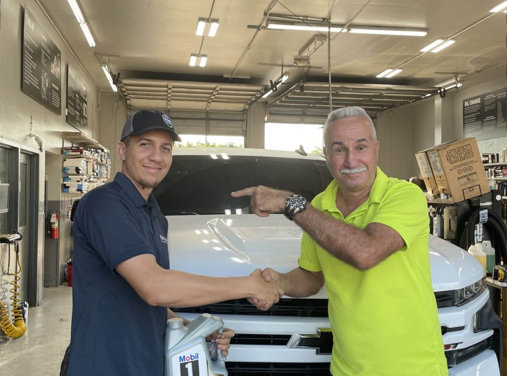 2 men shaking hands because the good service in town